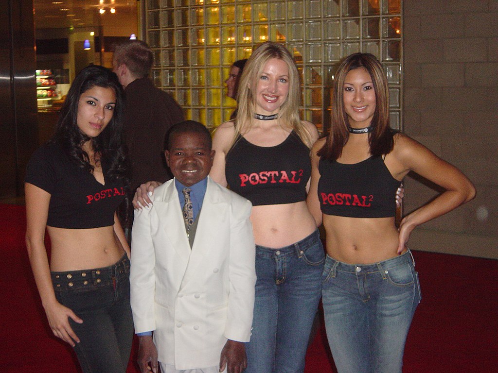 Gary Coleman posing with girls
