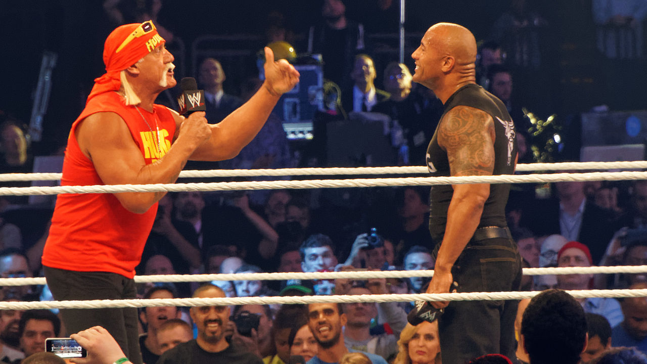 The Rock with Hulk Hogan in the ring