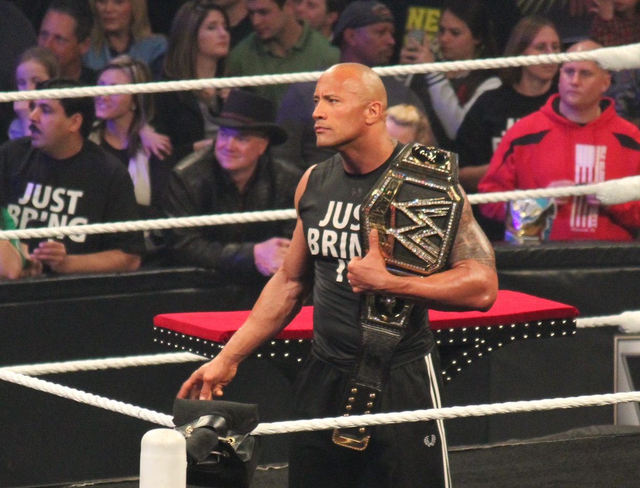 The Rock at WWE Raw ring.