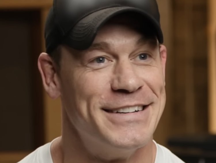 John Cena wearing a black cap