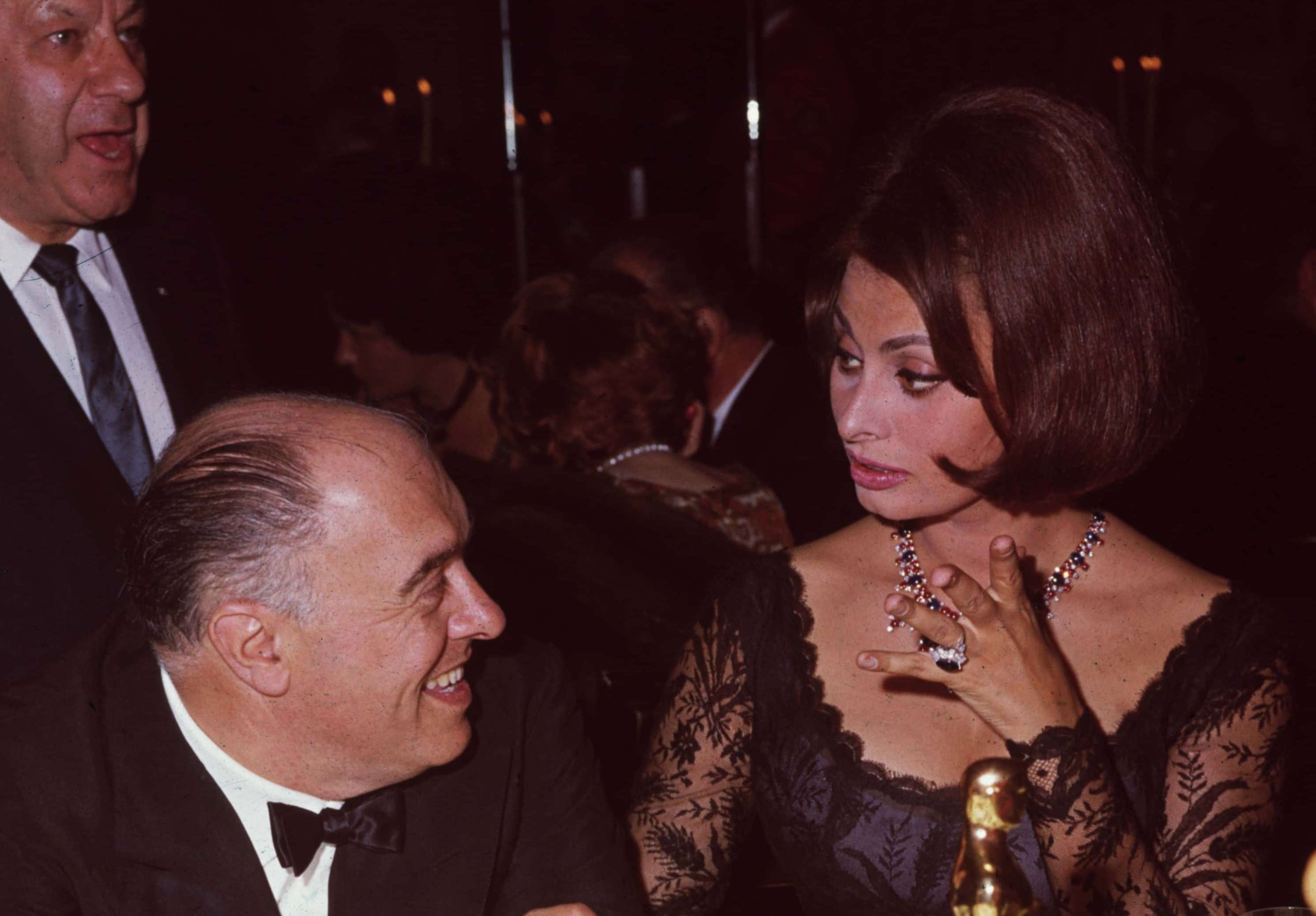 Italian actress Sophia Loren at dinner