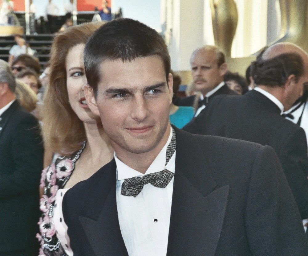 Tom Cruise wearing a suit
