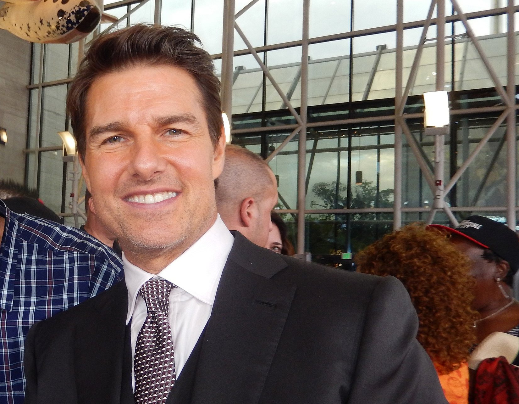 Tom Cruise in a black suit