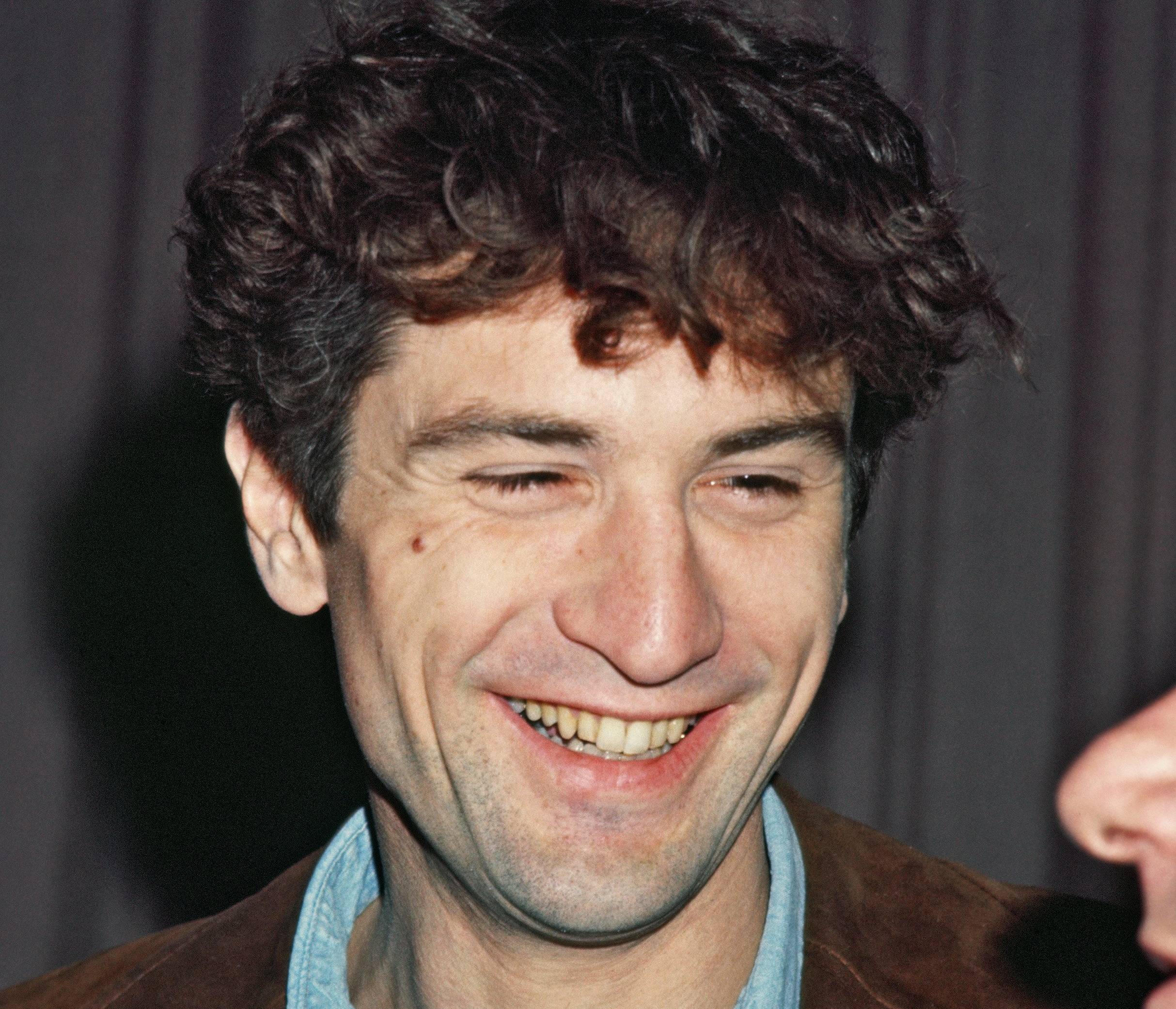 Robert De Niro in brown jacket