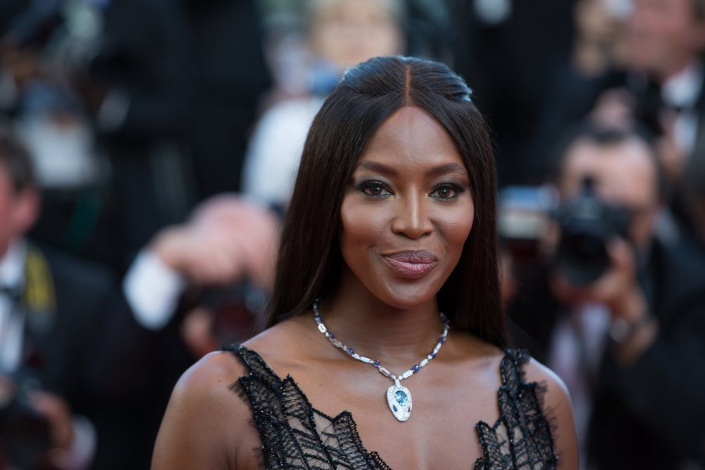 Naomi Campbell in black dress at an event