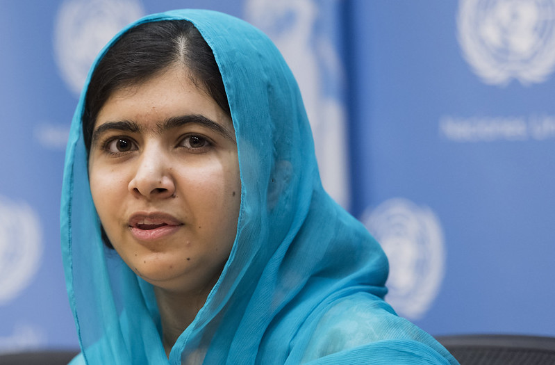 Malala Yousafzai wearing a blue hijab