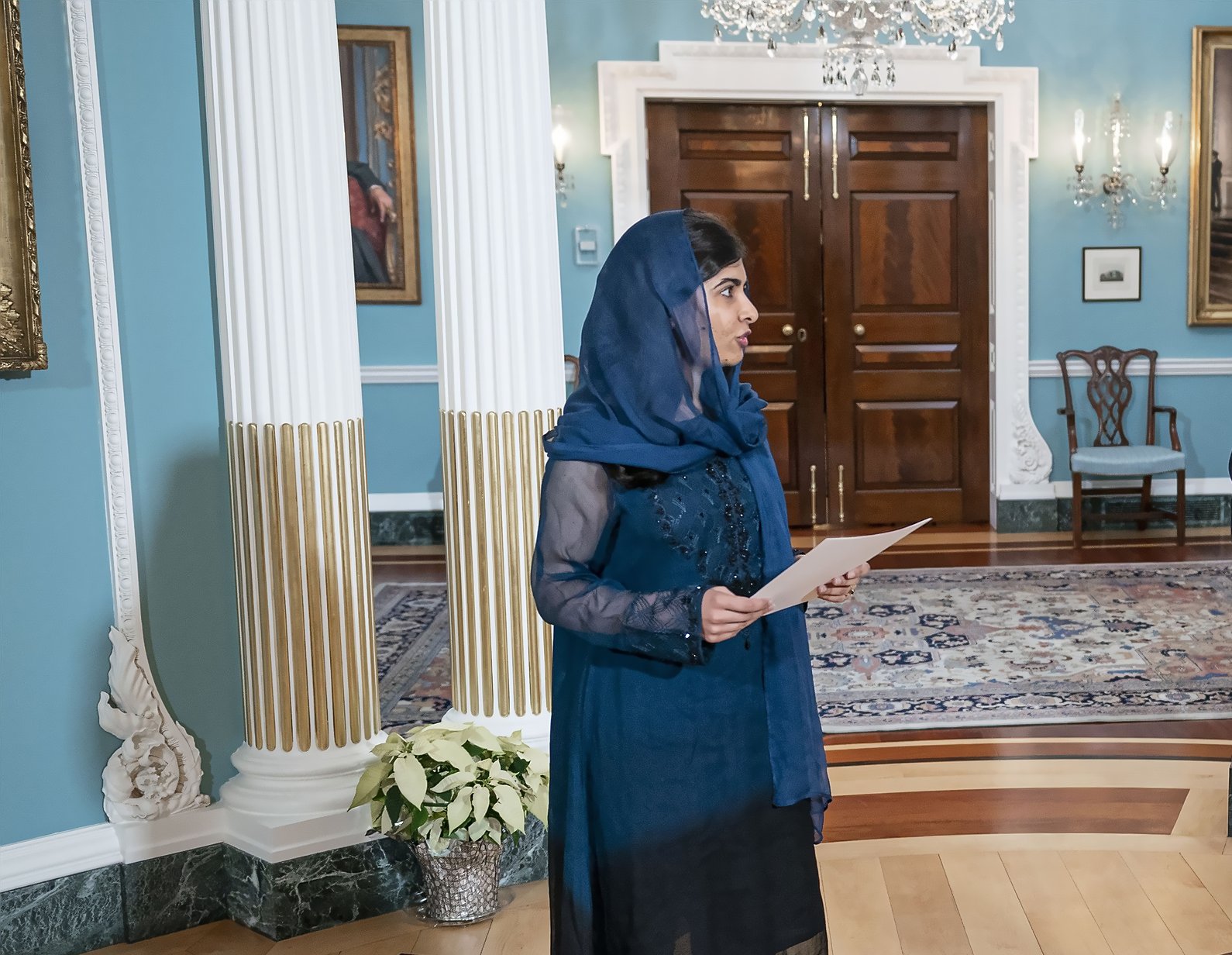 Malala Yousafzai wearing blue outfit