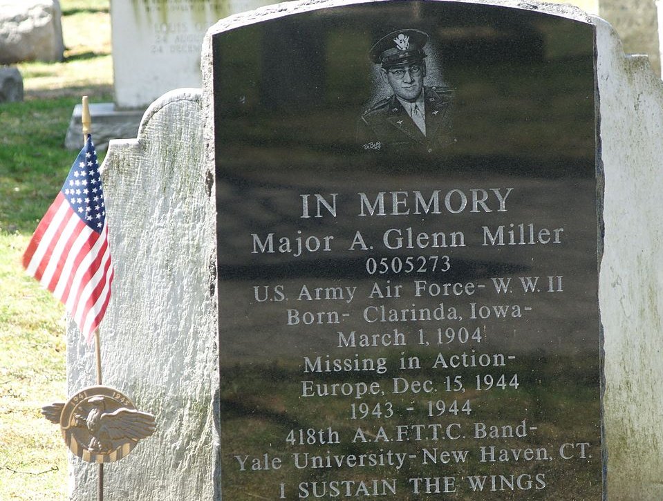 The monument stone with an image of Miller near the top