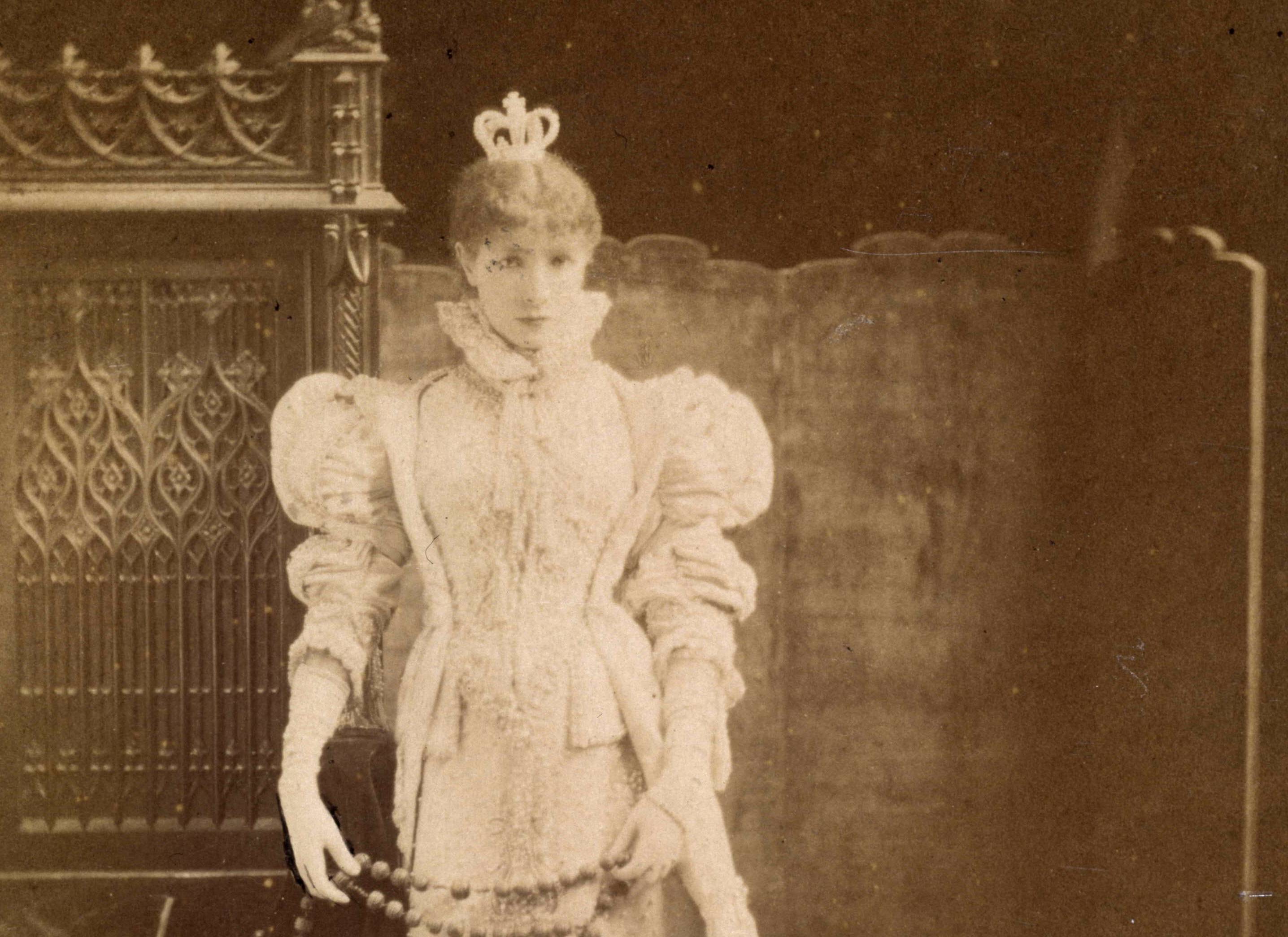 Portrait of Sarah Bernhardt in lace dress and crown