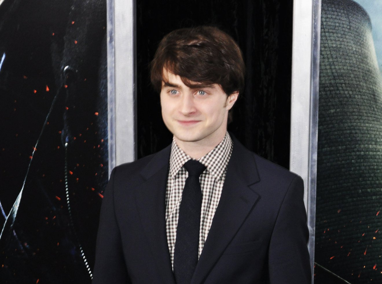 Daniel Radcliffe wearing a black suit