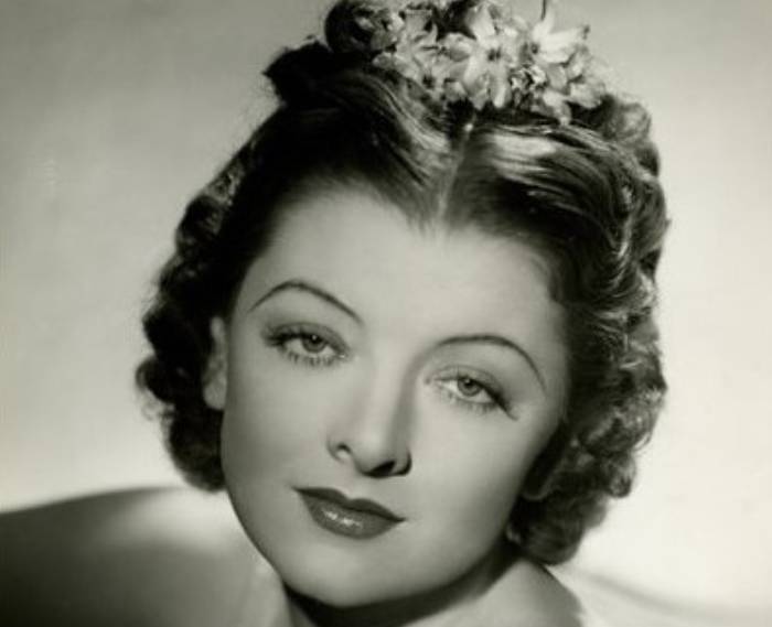 Myrna Loy 1937 with flowers in her hair