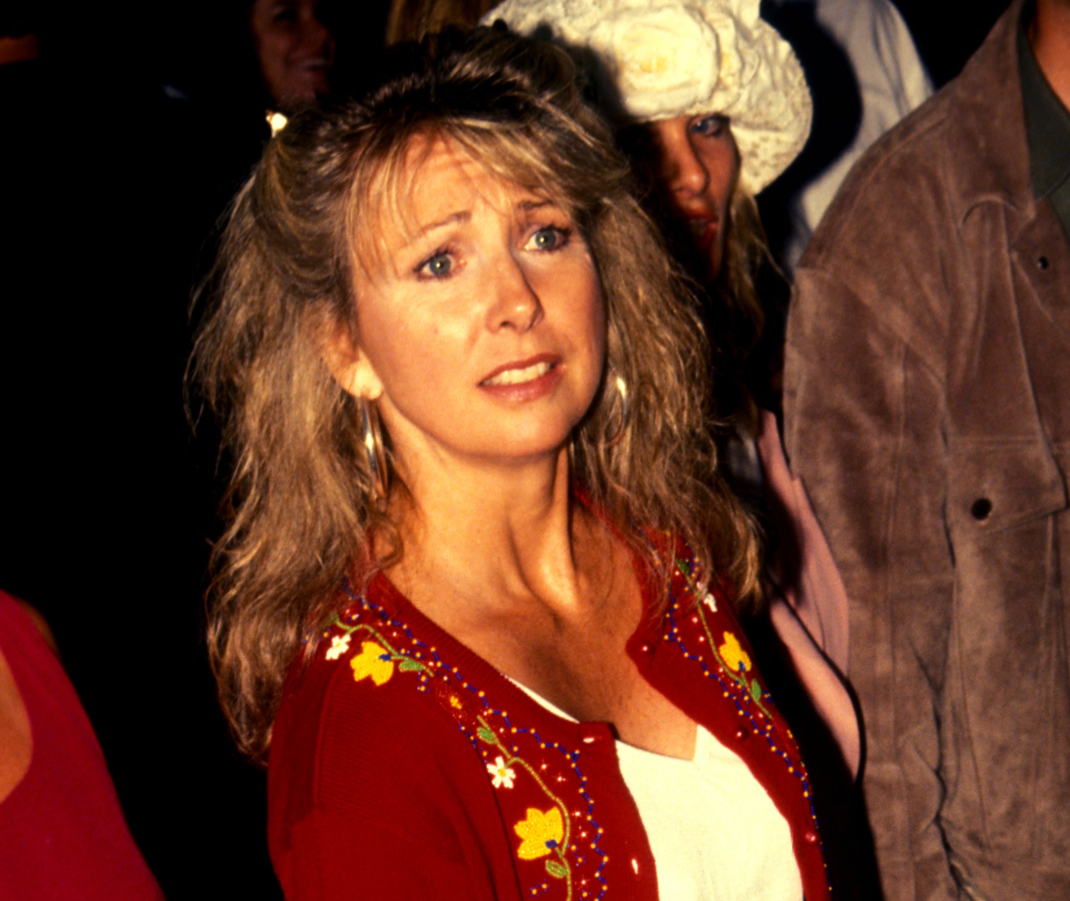 Teri Garr with a red jacket