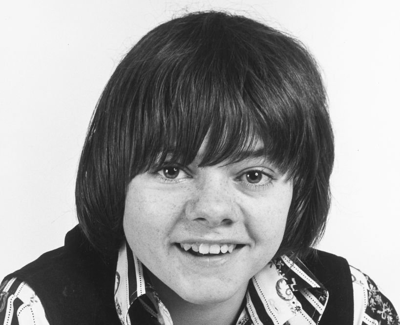 Jack Wild (1952-2006), British actor, wearing a black tank top