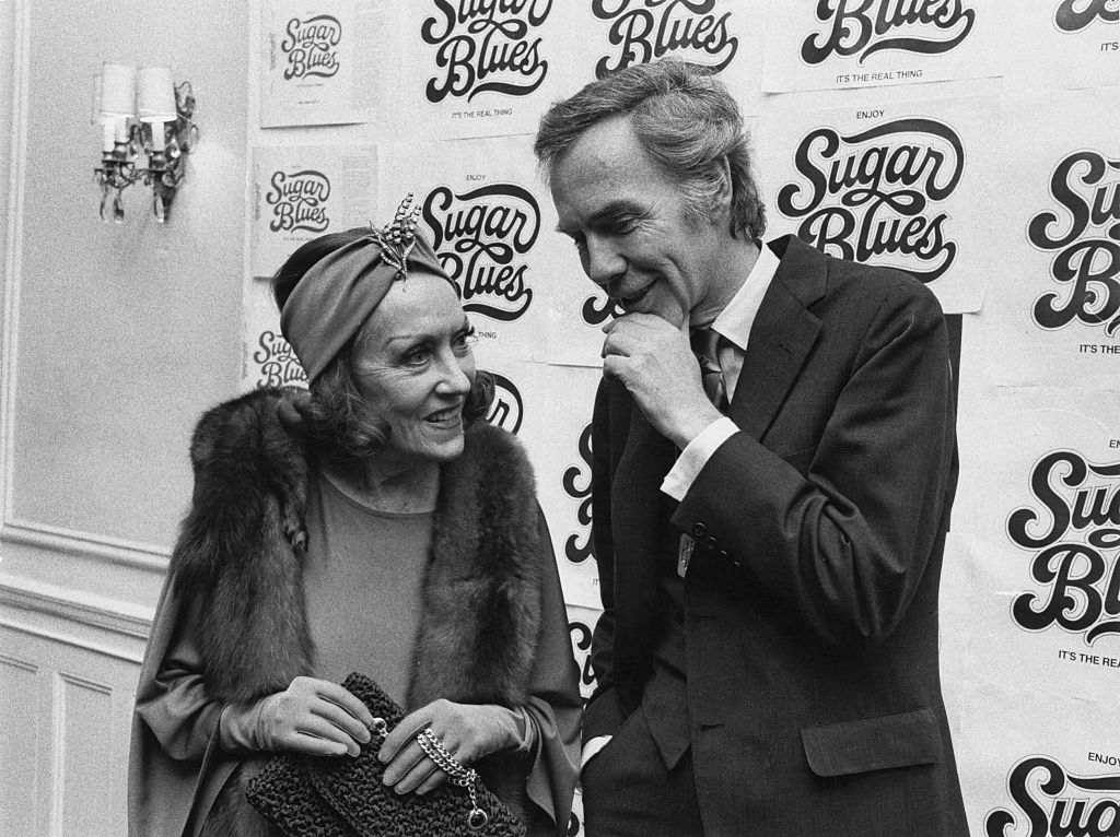 American actress Gloria Swanson (1899 - 1983) with her husband William Dufty at event