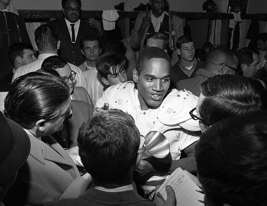 O.J. Simpson talking to reporters, 1967