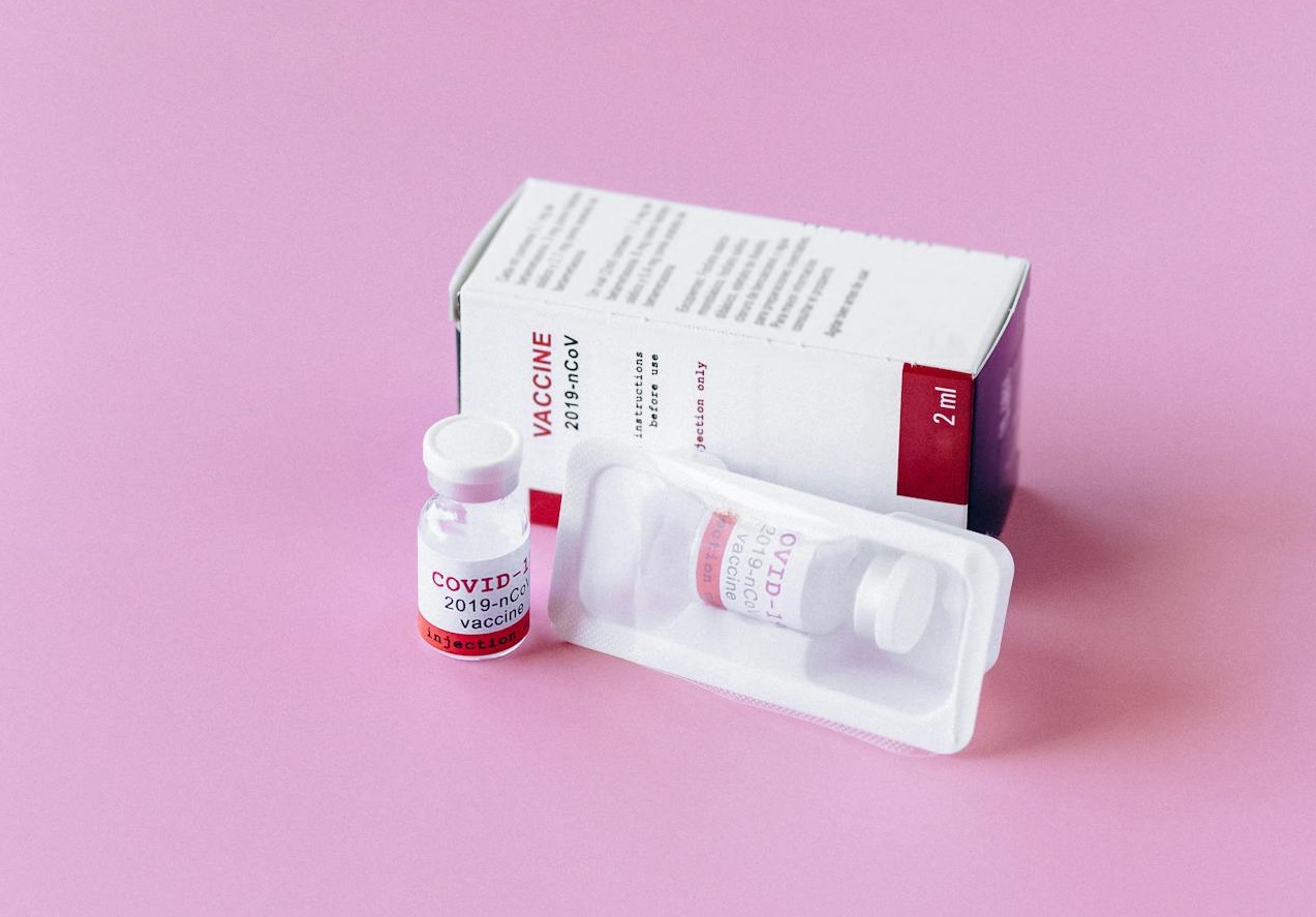 New Covid Vaccine on Pink Surface