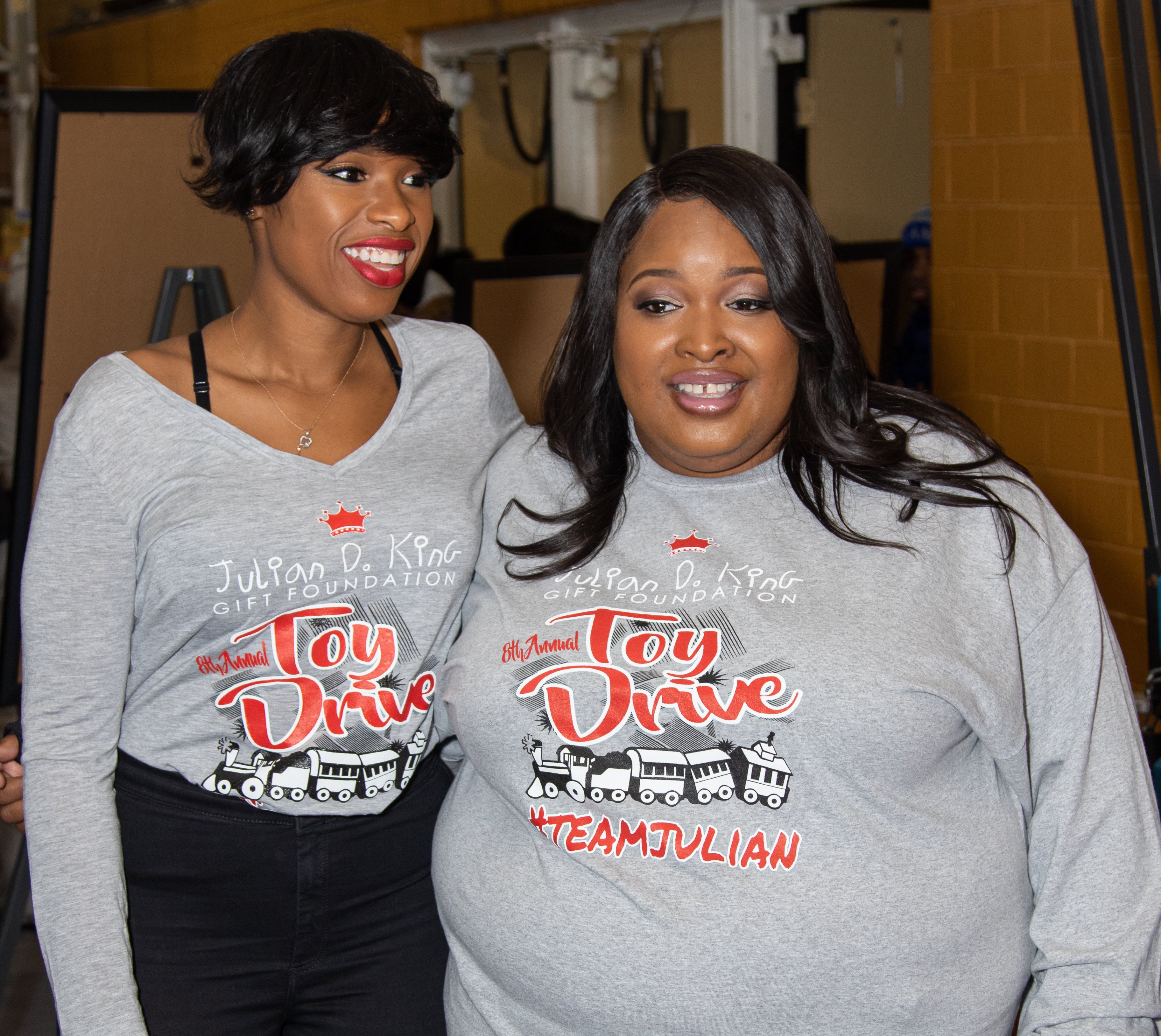 Jennifer and sister Julia Hudson attending annual Christmas toy drive