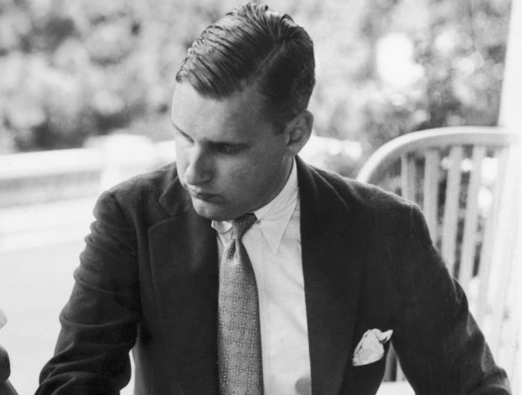 Photo of John Jacob Astor VI in a suit