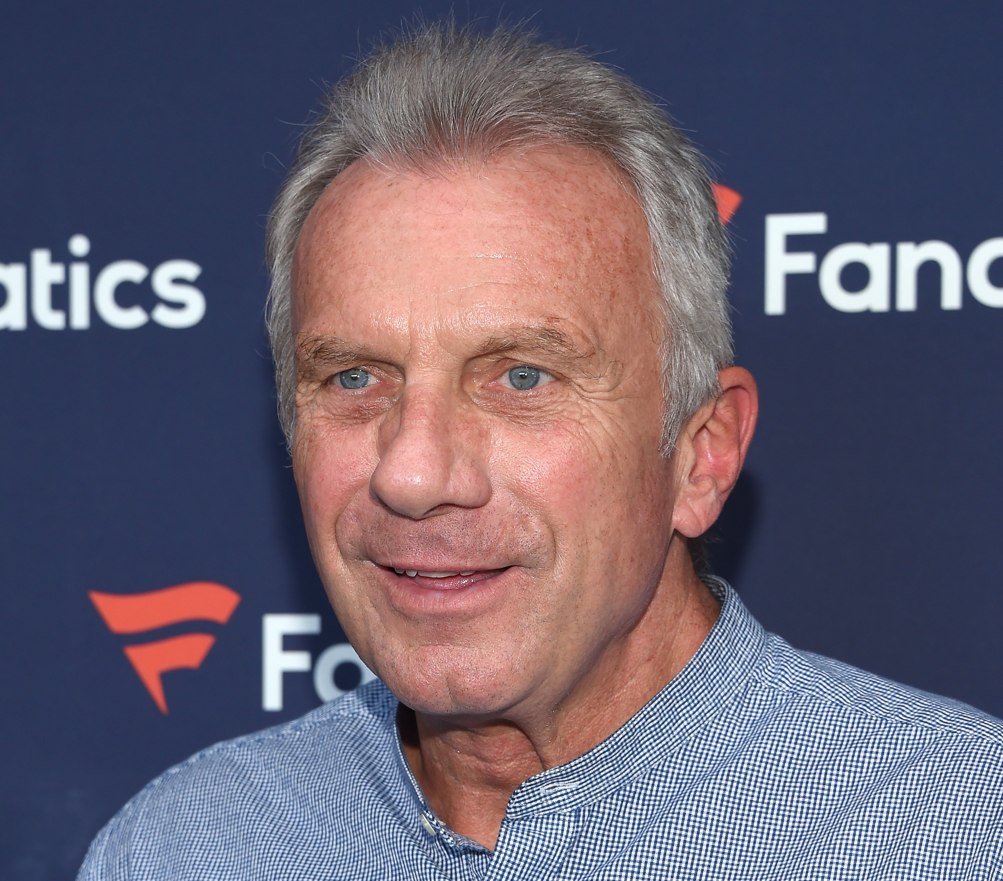 Joe Montana posing for a photo