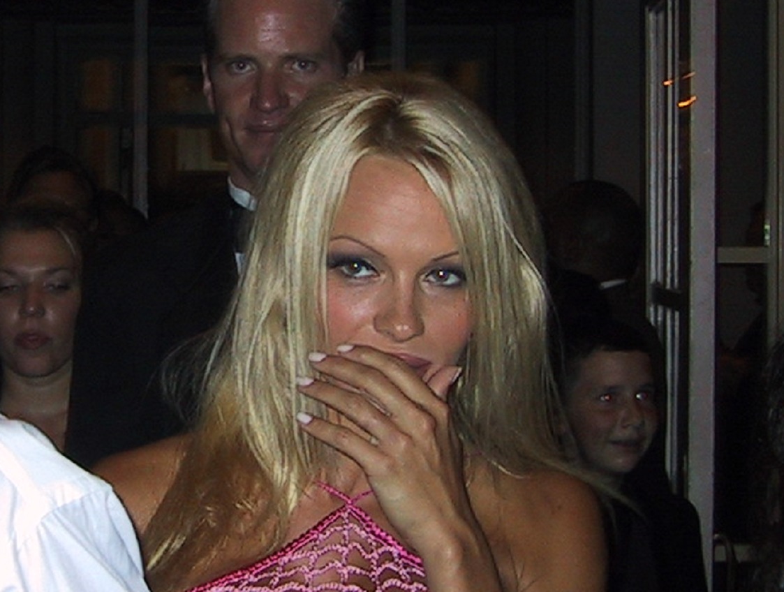 Pamela Anderson looking at camera.