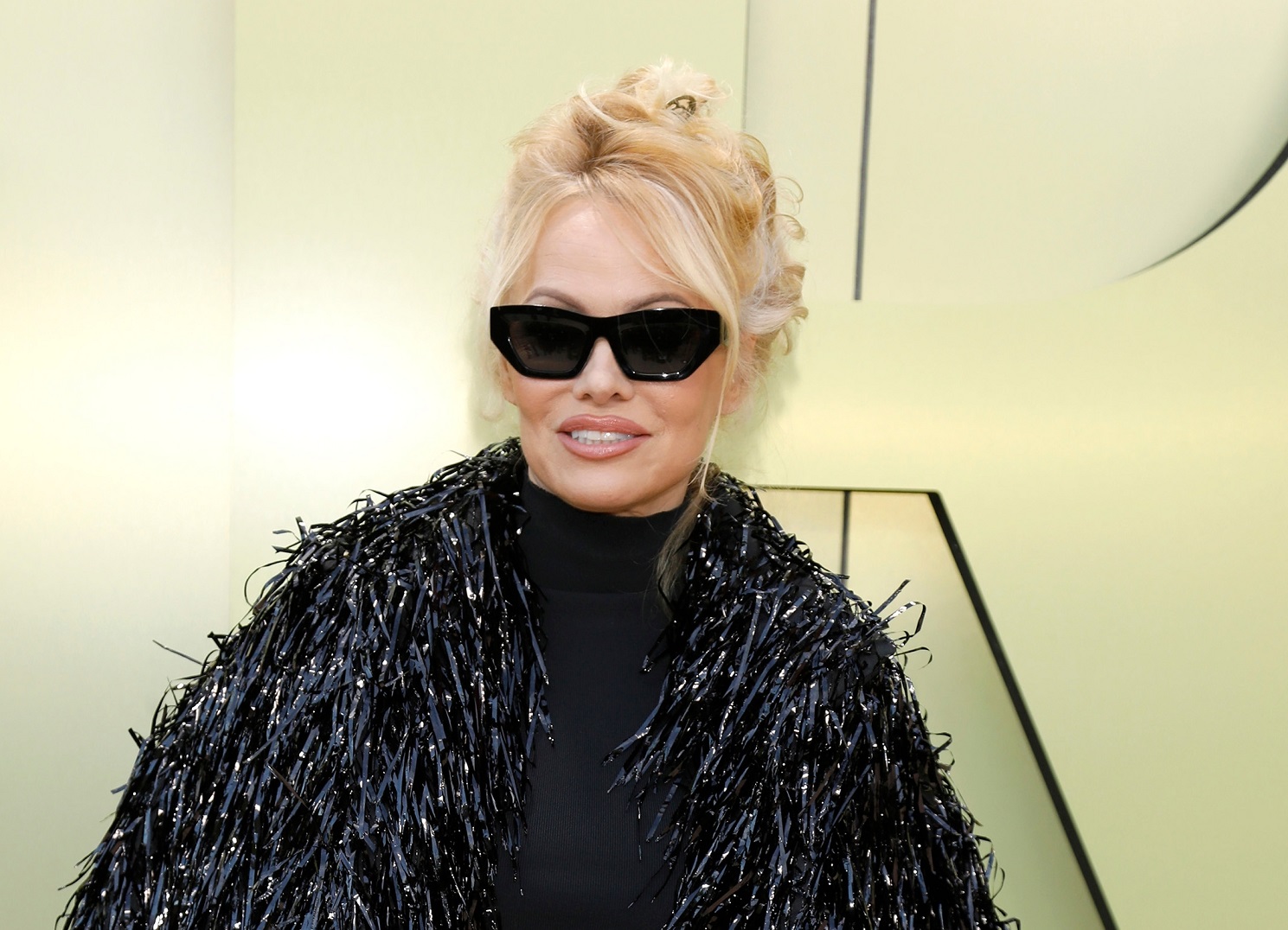 Pamela Anderson at the Versace FW23 Show at the Pacific Design Center on March 9, 2023 in West Hollywood, CA