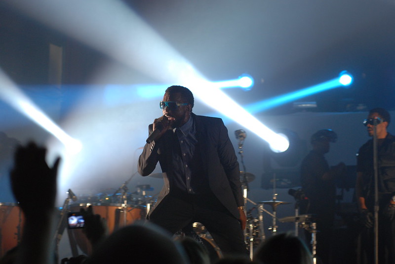 Kanye West in a black suit