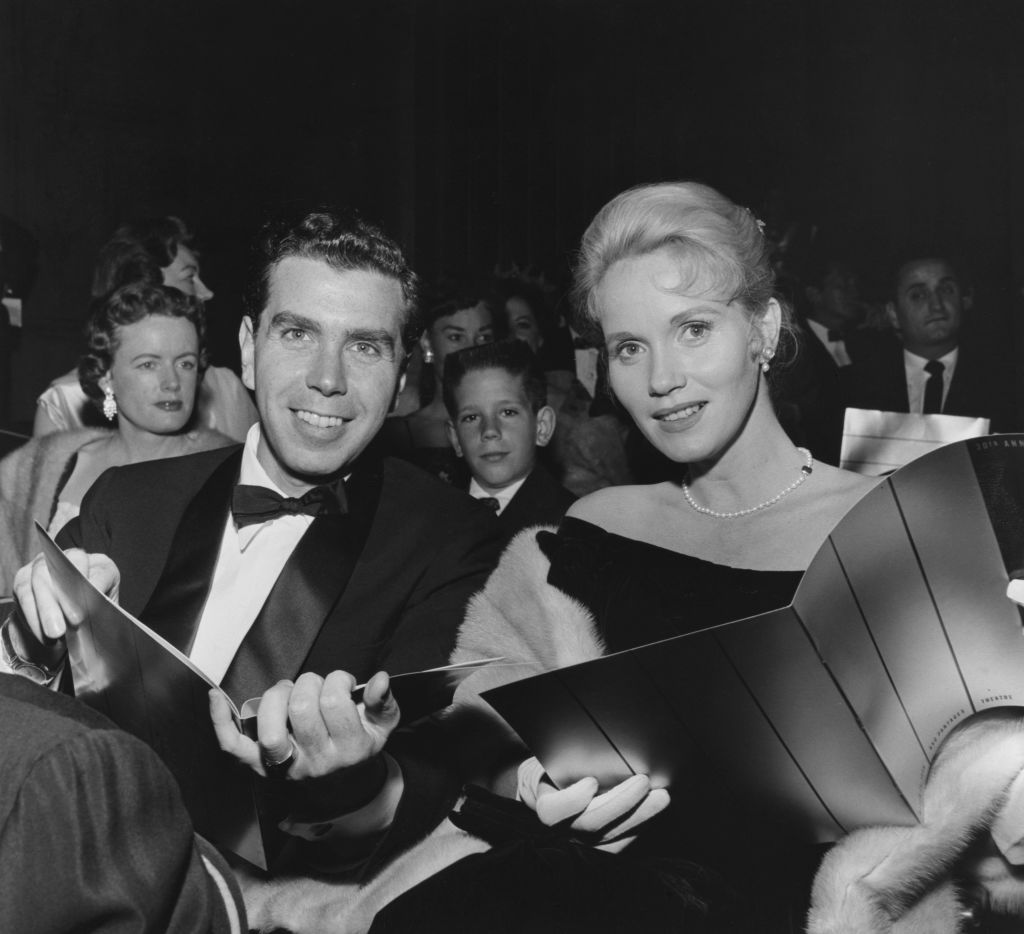 American actress Eva Marie Saint, wearing a black dress and her husband