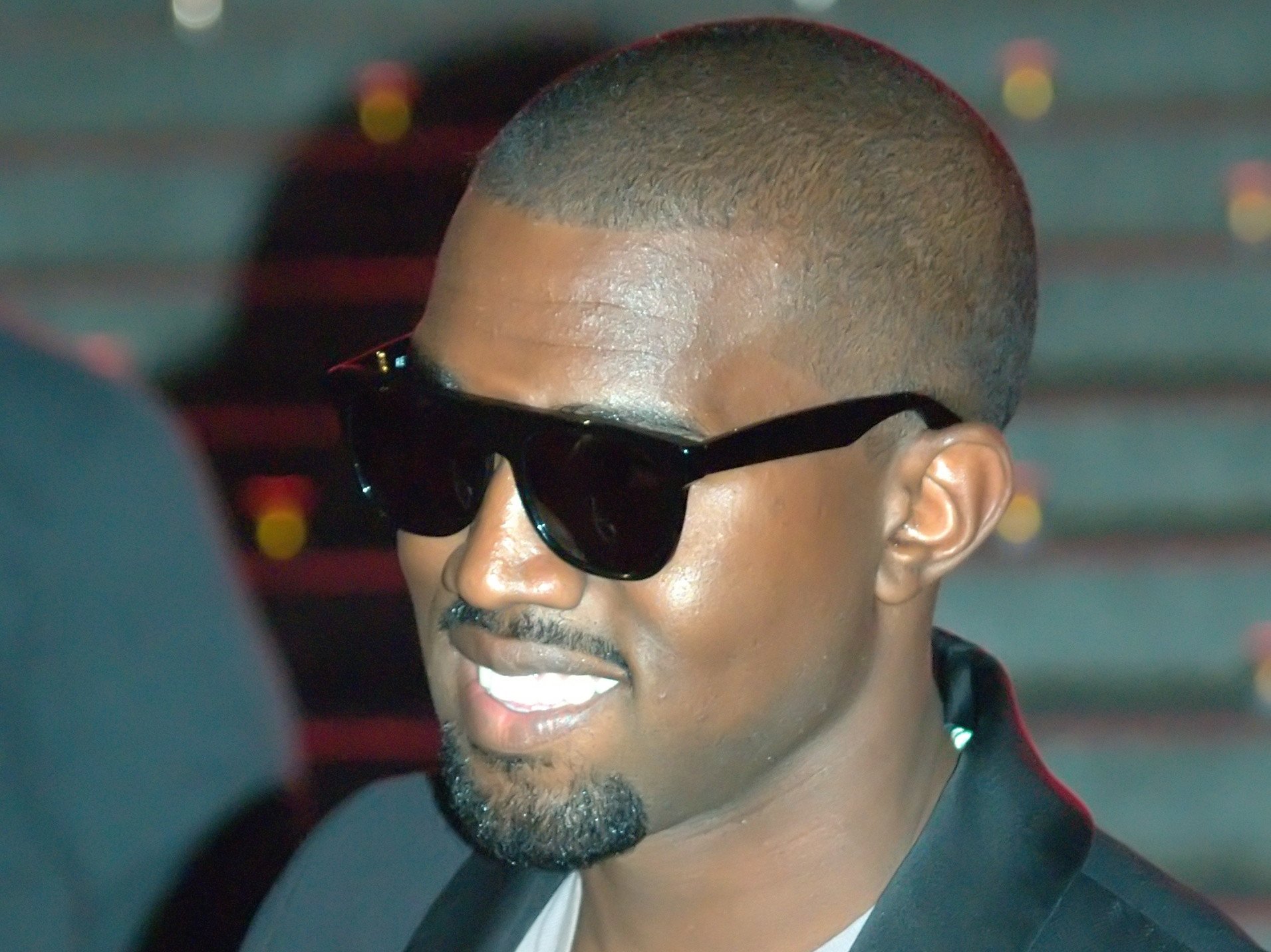 Kanye West in a black jacket