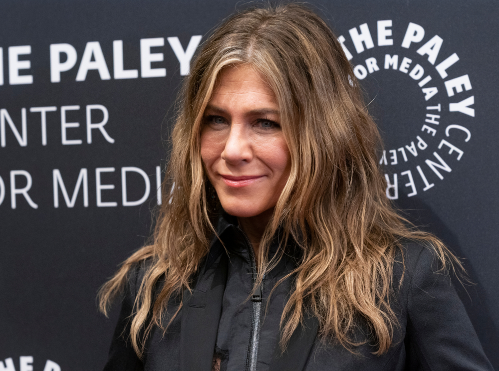 Jennifer Aniston wearing dress by Madison Margiela attends PaleyLive NY: Apple TV The Morning Show
