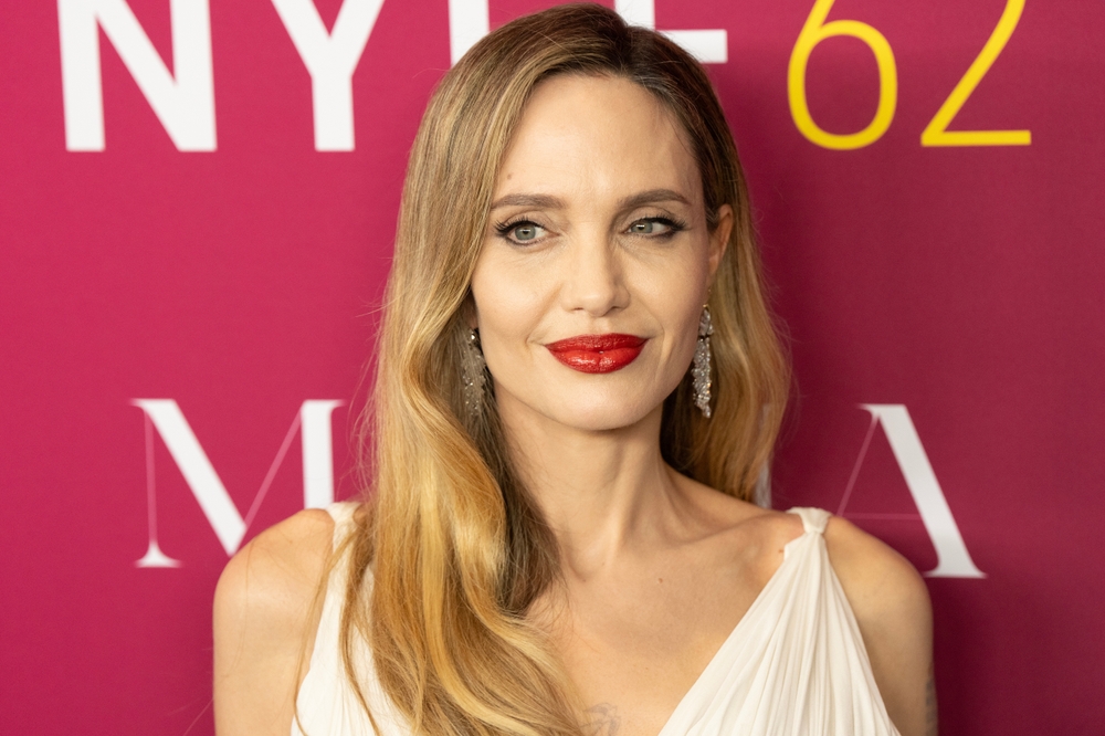 Angelina Jolie wearing vintage Madame Gres dress, Cartier jewlery and Aquazurra shoes