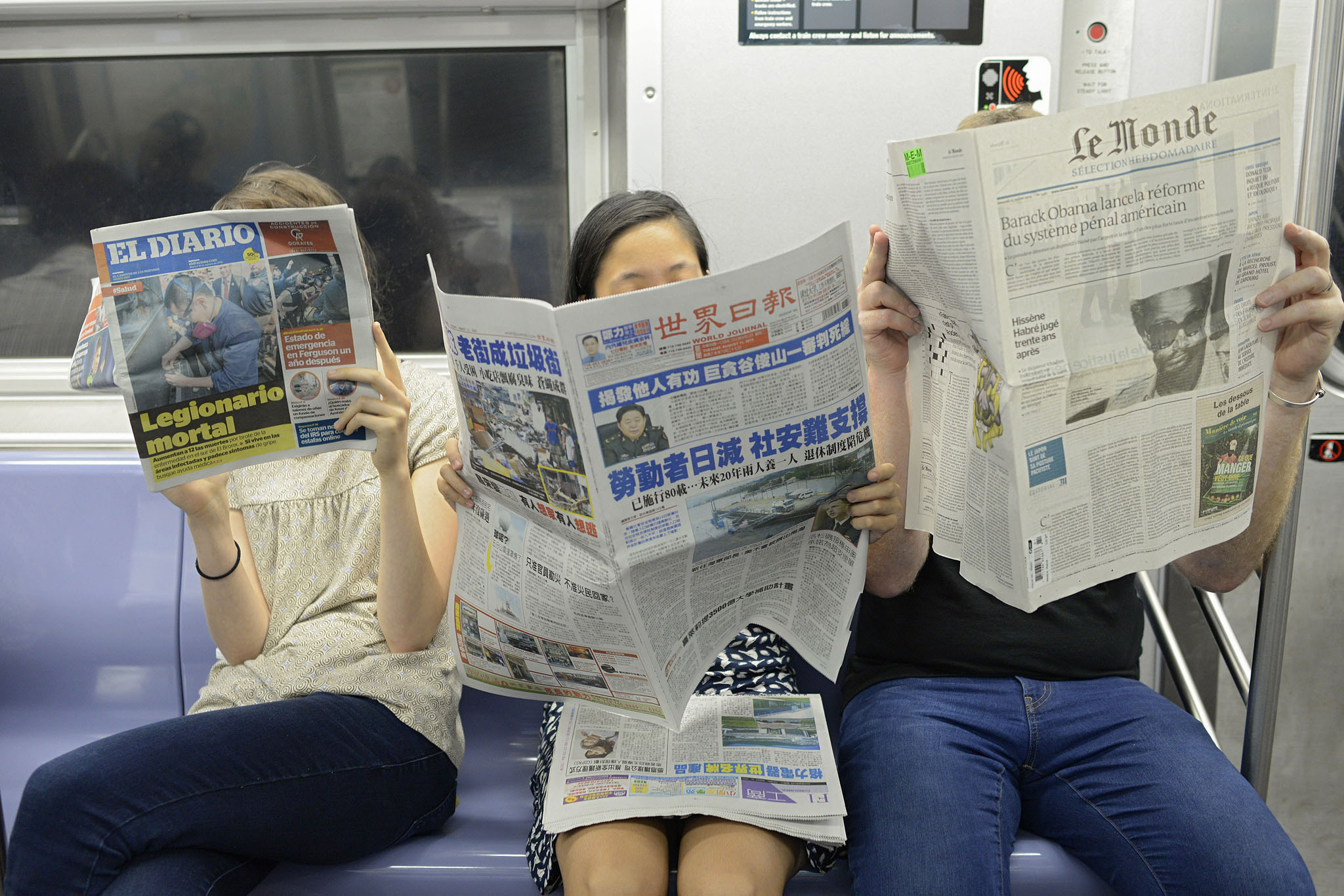 People reading newspapers
