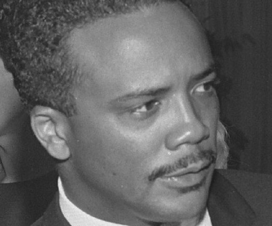 Quincy Jones looking at side - 1963