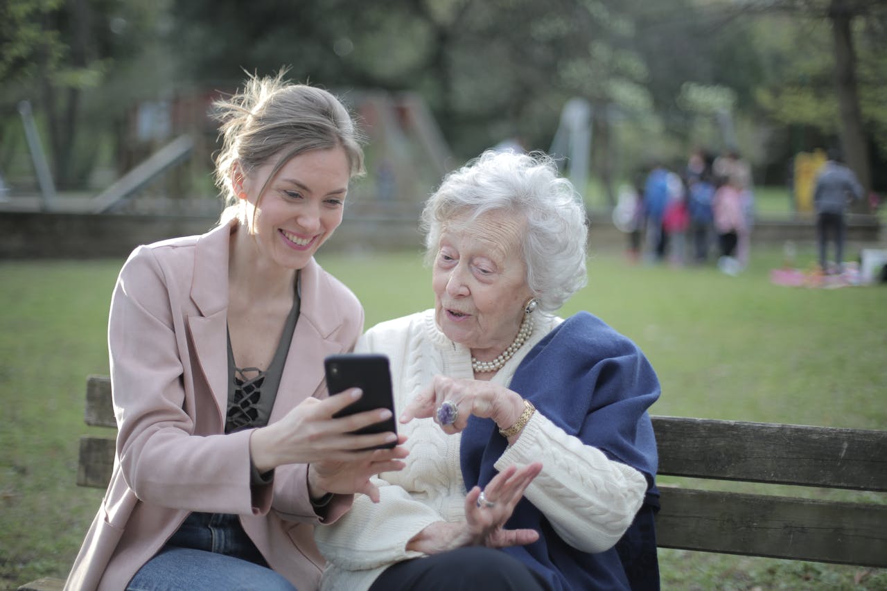 Cheerful senior mother and adult daughter