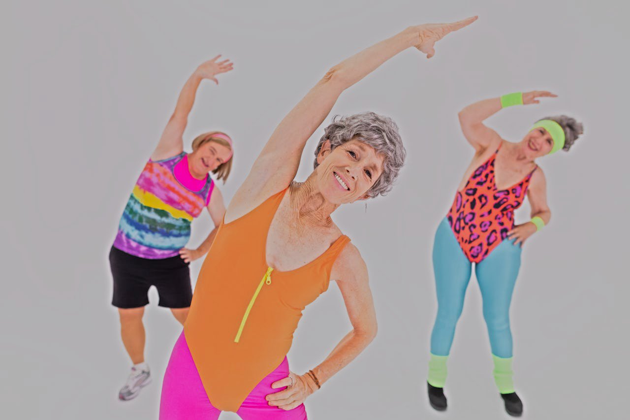 Three Senior Women in colorful workout clothes