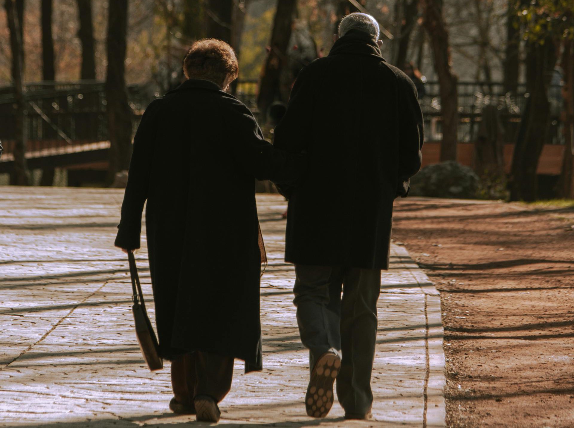 Back View of a Old Couple Walking Together