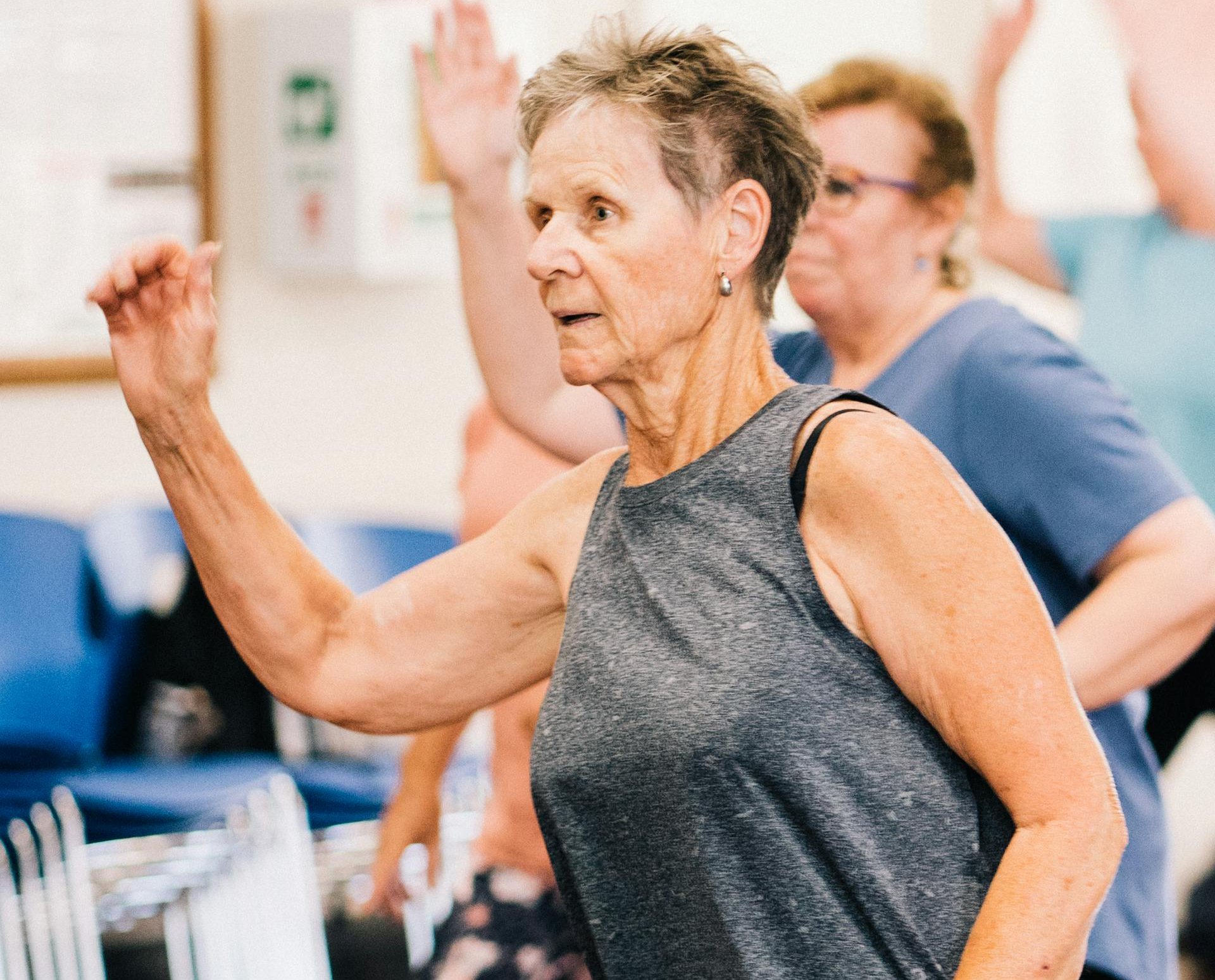 Elderly Woman in Gray Tank Top