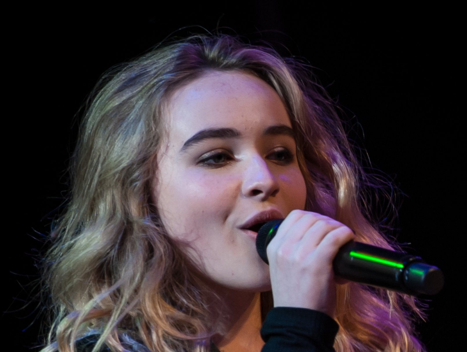 Portrait Photo of American singer Sabrina Carpenter Performing on stage