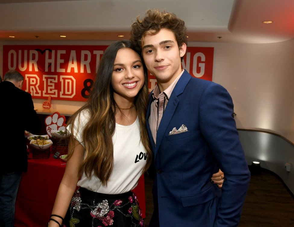 Olivia Rodrigo (L) and Joshua Bassett pose at the after party for the premiere of Disney+'s 