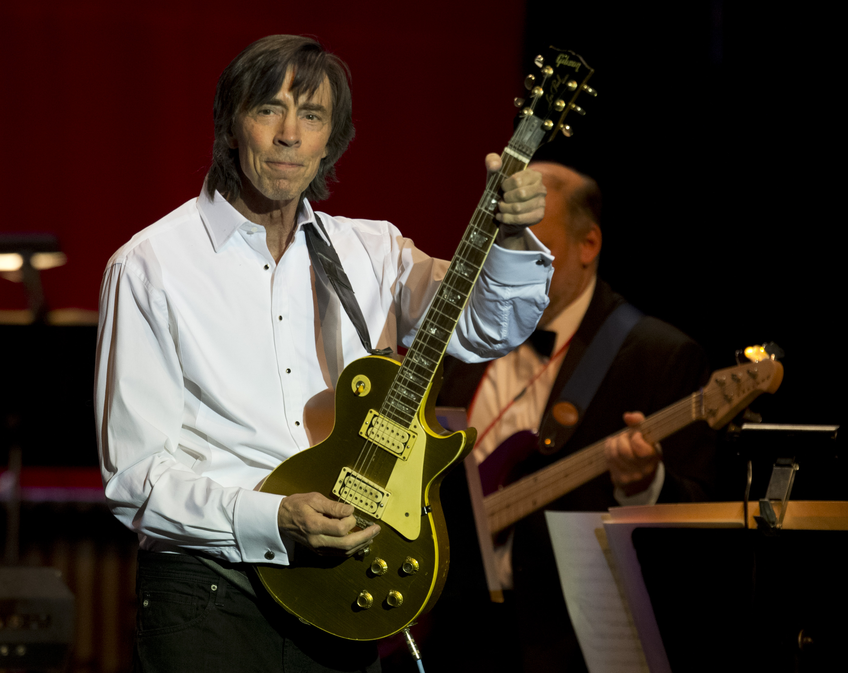 Tom Scholz, who plays guitar with the band Boston, performs