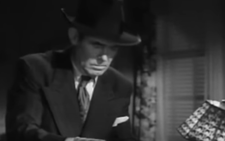 A screenshot from the movie The Fat Man