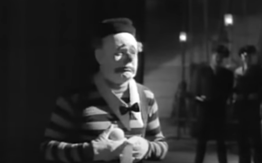 A screenshot from the movie The Fat Man