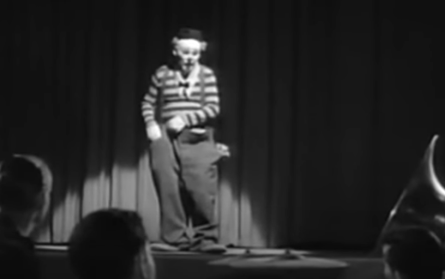 A screenshot from the movie The Fat Man