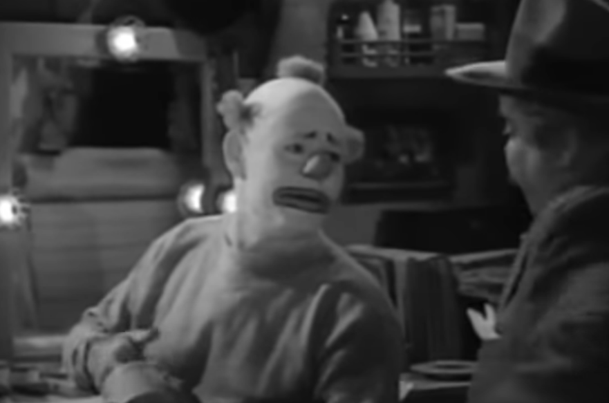A screenshot from the movie The Fat Man