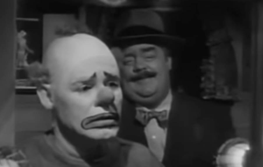 A screenshot from the movie The Fat Man