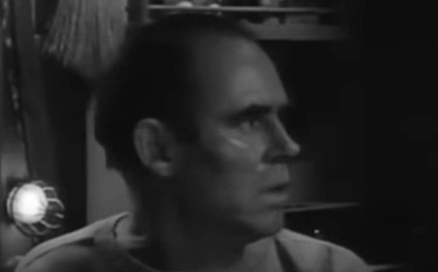 A screenshot from the movie The Fat Man