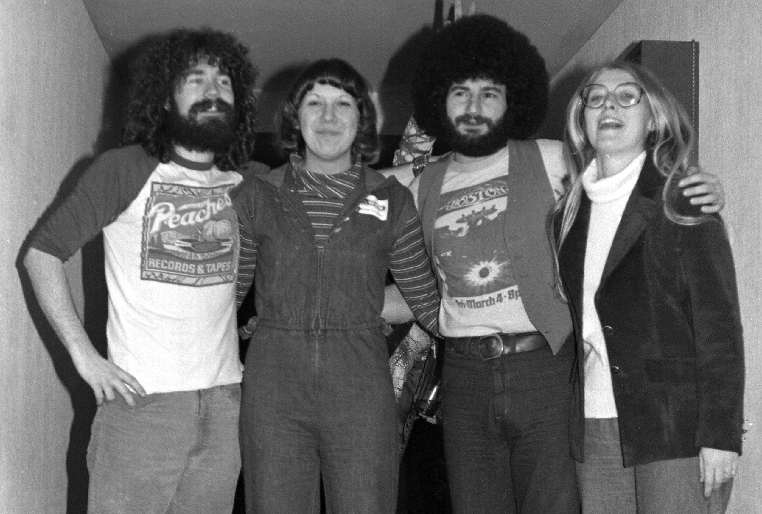 Brad Delp (1951-2007) and Sib Hashian (1949-2017), both of the rock band Boston