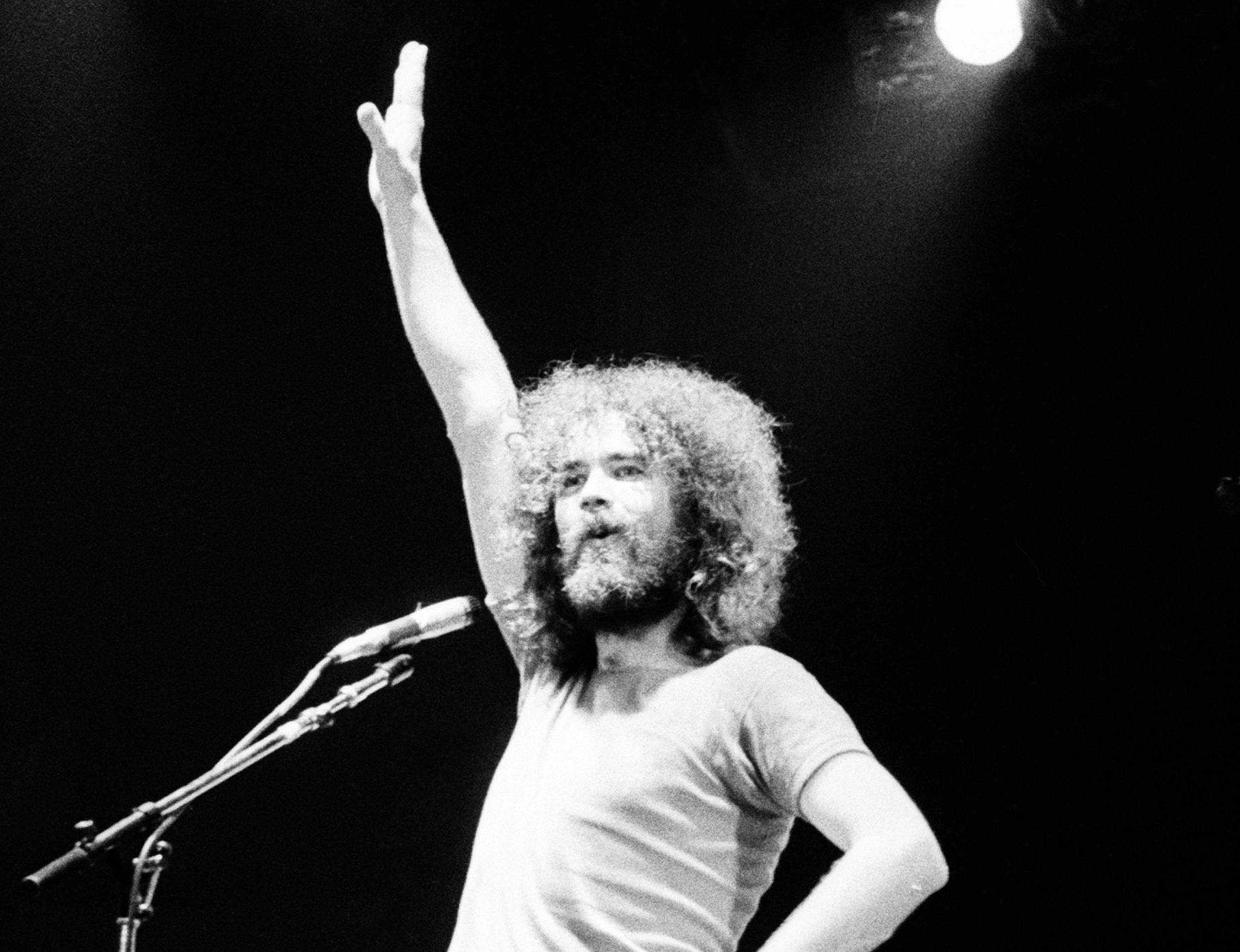 Brad Delp of Boston performs in concert