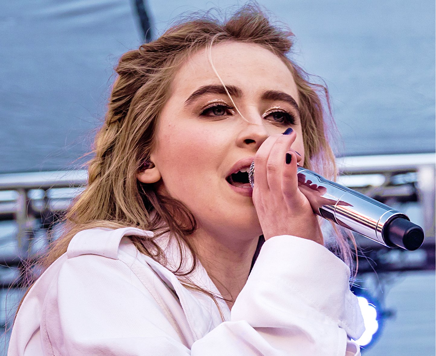 Sabrina Carpenter performing live at the 102.7 KIIS FM Jingle Ball Village