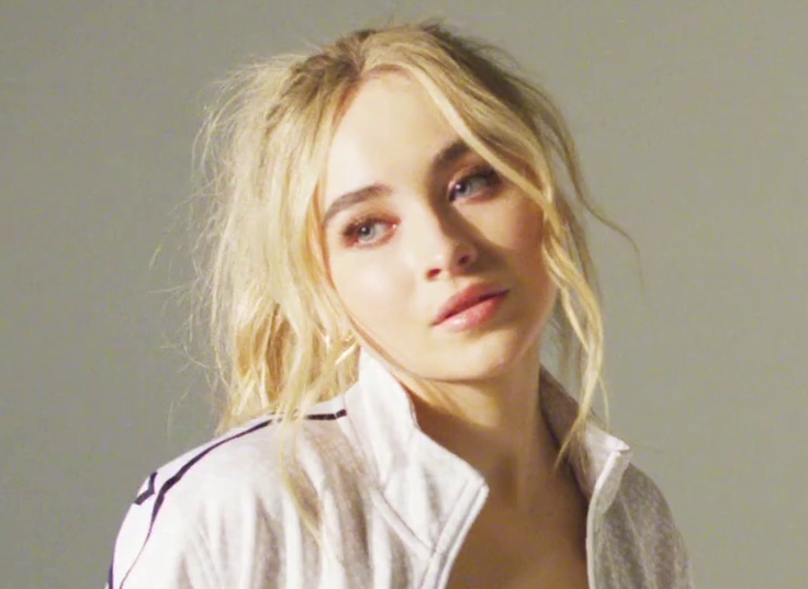 Portrait Photo of Sabrina Carpenter wearing white outfit