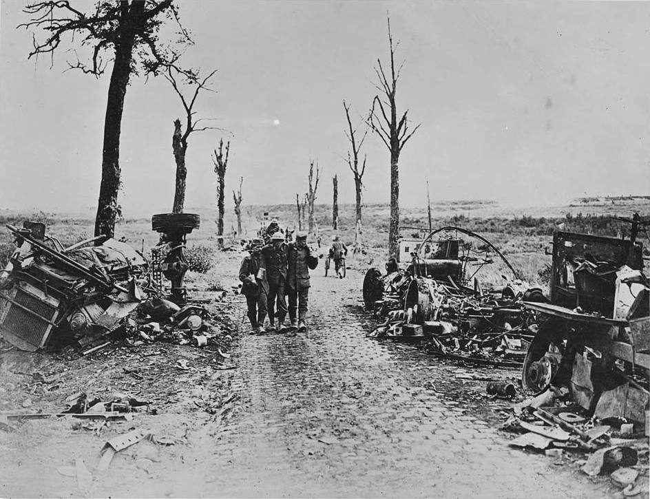 German soldiers supporting an injured Canadian soldier during the Second Battle of the Somme